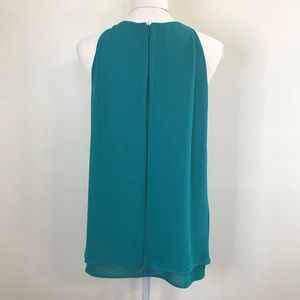Teal sleeveless flowey draped back tank blouse